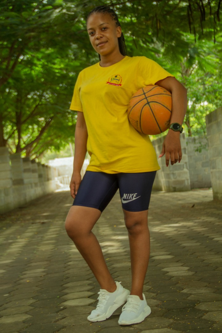 Student holding a basketball